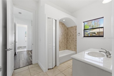 Stunning Custom Pool Home in Desirable Pine Lakes! Welcome to on The Grand Club - Pine Lakes Course in Florida - for sale on GolfHomes.com, golf home, golf lot