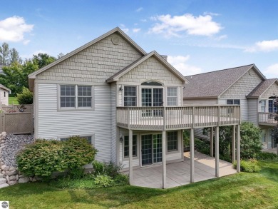 Enjoy low-maintenance living with beautiful golf course views in on Crown Golf Course in Michigan - for sale on GolfHomes.com, golf home, golf lot