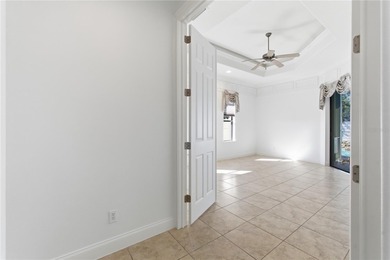 Stunning Custom Pool Home in Desirable Pine Lakes! Welcome to on The Grand Club - Pine Lakes Course in Florida - for sale on GolfHomes.com, golf home, golf lot