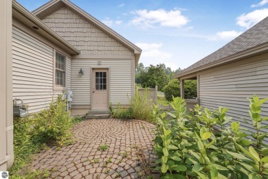 Enjoy low-maintenance living with beautiful golf course views in on Crown Golf Course in Michigan - for sale on GolfHomes.com, golf home, golf lot