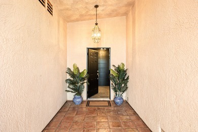 Step inside your own private, gated courtyard and prepare to be on Palm Desert Country Club in California - for sale on GolfHomes.com, golf home, golf lot