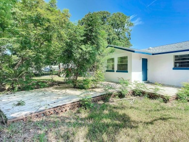 This beautifully remodeled 3/2 ranch style home with a one car on Daytona Beach Golf Club in Florida - for sale on GolfHomes.com, golf home, golf lot