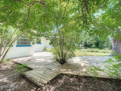 This beautifully remodeled 3/2 ranch style home with a one car on Daytona Beach Golf Club in Florida - for sale on GolfHomes.com, golf home, golf lot