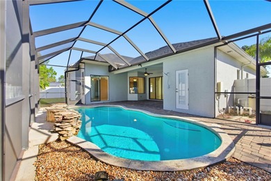 Stunning Custom Pool Home in Desirable Pine Lakes! Welcome to on The Grand Club - Pine Lakes Course in Florida - for sale on GolfHomes.com, golf home, golf lot