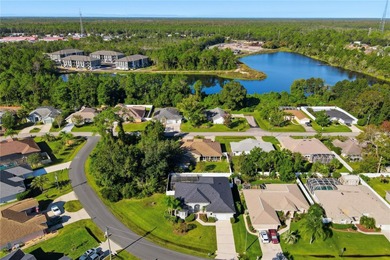 Stunning Custom Pool Home in Desirable Pine Lakes! Welcome to on The Grand Club - Pine Lakes Course in Florida - for sale on GolfHomes.com, golf home, golf lot