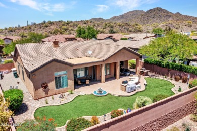 Discover this stunning corner-lot home offering 3 spacious on Anthem Golf and Country Club  in Arizona - for sale on GolfHomes.com, golf home, golf lot