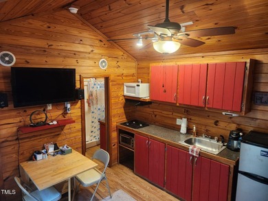 Welcome to the Lake Life! This great triple multi use lot is on River Golf and Country Club at Lake Royale in North Carolina - for sale on GolfHomes.com, golf home, golf lot