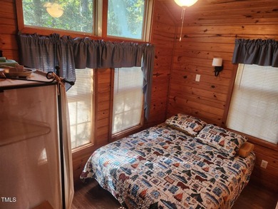 Welcome to the Lake Life! This great triple multi use lot is on River Golf and Country Club at Lake Royale in North Carolina - for sale on GolfHomes.com, golf home, golf lot