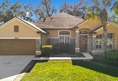Under contract-accepting backup offers. * PRICE IMPROVEMENT * on Oaks National Golf Course in Florida - for sale on GolfHomes.com, golf home, golf lot