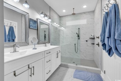 Don't miss out on this exquisite, enclosed raised beach house on Beachwood Golf Club in South Carolina - for sale on GolfHomes.com, golf home, golf lot