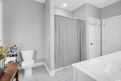 Don't miss out on this exquisite, enclosed raised beach house on Beachwood Golf Club in South Carolina - for sale on GolfHomes.com, golf home, golf lot