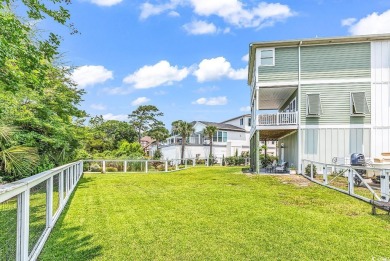 Don't miss out on this exquisite, enclosed raised beach house on Beachwood Golf Club in South Carolina - for sale on GolfHomes.com, golf home, golf lot