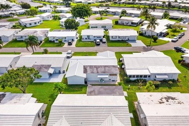 This beautiful Edgewood model has been perfectly & totally on Leisureville Community Golf Course in Florida - for sale on GolfHomes.com, golf home, golf lot