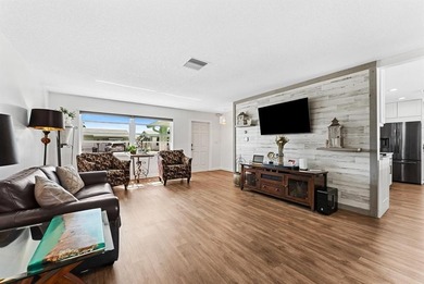 This beautiful Edgewood model has been perfectly & totally on Leisureville Community Golf Course in Florida - for sale on GolfHomes.com, golf home, golf lot