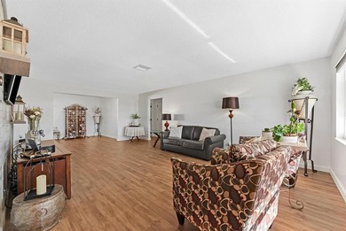 This beautiful Edgewood model has been perfectly & totally on Leisureville Community Golf Course in Florida - for sale on GolfHomes.com, golf home, golf lot