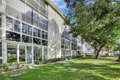 Welcome home to this desirable ground floor condo in one of the on Wynmoor Golf Course in Florida - for sale on GolfHomes.com, golf home, golf lot
