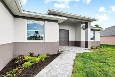 Welcome to your dream home oasis in the heart of Cape Coral on Coral Oaks Golf Course in Florida - for sale on GolfHomes.com, golf home, golf lot