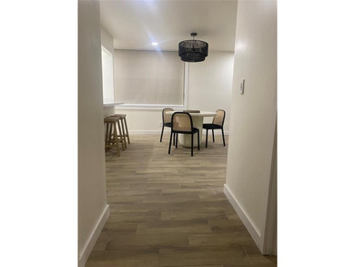 Beautifully remodeled 2 bedroom, 2 bath condo featuring a bright on Pine Island Ridge Country Club in Florida - for sale on GolfHomes.com, golf home, golf lot