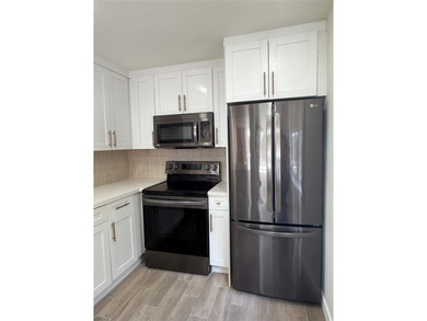 Beautifully remodeled 2 bedroom, 2 bath condo featuring a bright on Pine Island Ridge Country Club in Florida - for sale on GolfHomes.com, golf home, golf lot