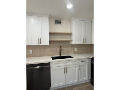 Beautifully remodeled 2 bedroom, 2 bath condo featuring a bright on Pine Island Ridge Country Club in Florida - for sale on GolfHomes.com, golf home, golf lot