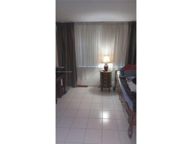 Don't miss this beautifully maintained ground floor corner unit on Pembroke Lakes Golf Club in Florida - for sale on GolfHomes.com, golf home, golf lot