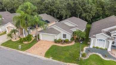 Located in the 55+ community of High Vista, this Ridge Crest on Ridgewood Lakes Golf and Country Club in Florida - for sale on GolfHomes.com, golf home, golf lot