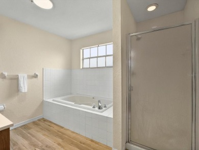 This stunning two-bedroom two-bathroom, third-floor, corner unit on Hunters Creek Golf Course in Florida - for sale on GolfHomes.com, golf home, golf lot
