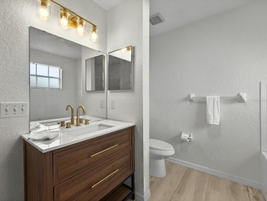This stunning two-bedroom two-bathroom, third-floor, corner unit on Hunters Creek Golf Course in Florida - for sale on GolfHomes.com, golf home, golf lot