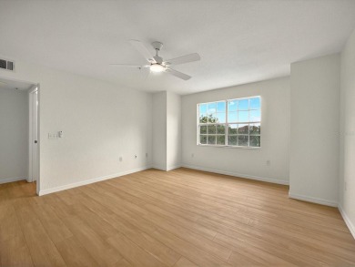 This stunning two-bedroom two-bathroom, third-floor, corner unit on Hunters Creek Golf Course in Florida - for sale on GolfHomes.com, golf home, golf lot
