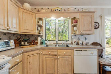 Price REDUCED - Act now on this beautiful coastal retreat! 

 on Sea Trail Golf Resort in North Carolina - for sale on GolfHomes.com, golf home, golf lot