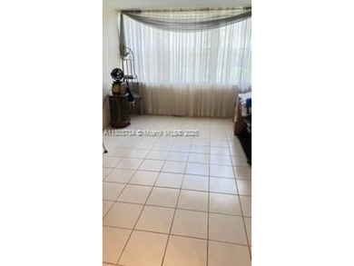 Don't miss this beautifully maintained ground floor corner unit on Pembroke Lakes Golf Club in Florida - for sale on GolfHomes.com, golf home, golf lot