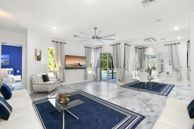 This lovely home, redesigned to be a peaceful retreat, is just a on The Wanderers Club in Florida - for sale on GolfHomes.com, golf home, golf lot