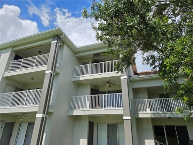 This stunning two-bedroom two-bathroom, third-floor, corner unit on Hunters Creek Golf Course in Florida - for sale on GolfHomes.com, golf home, golf lot