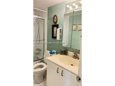 Don't miss this beautifully maintained ground floor corner unit on Pembroke Lakes Golf Club in Florida - for sale on GolfHomes.com, golf home, golf lot