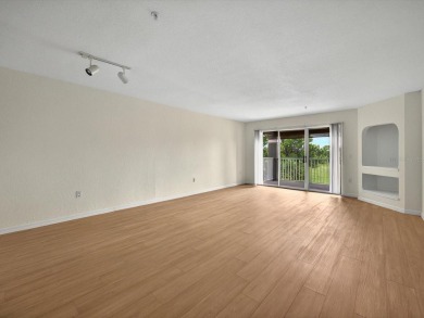 This stunning two-bedroom two-bathroom, third-floor, corner unit on Hunters Creek Golf Course in Florida - for sale on GolfHomes.com, golf home, golf lot