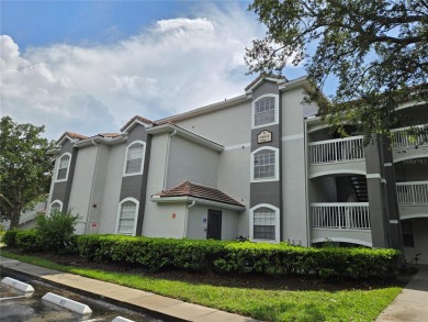 This stunning two-bedroom two-bathroom, third-floor, corner unit on Hunters Creek Golf Course in Florida - for sale on GolfHomes.com, golf home, golf lot