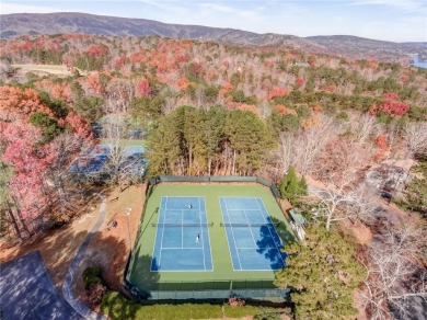 This gently sloped lot backs directly up to the lush fairways of on The Highlands Course at Lake Arrowhead in Georgia - for sale on GolfHomes.com, golf home, golf lot