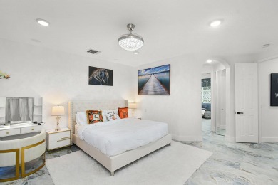 This lovely home, redesigned to be a peaceful retreat, is just a on The Wanderers Club in Florida - for sale on GolfHomes.com, golf home, golf lot