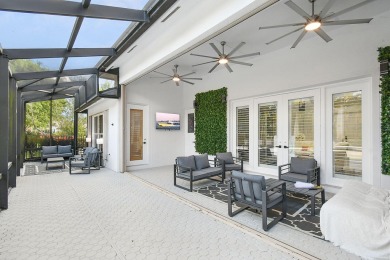 This lovely home, redesigned to be a peaceful retreat, is just a on The Wanderers Club in Florida - for sale on GolfHomes.com, golf home, golf lot