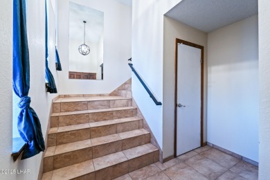 Enjoy panoramic views of the lake, golf course, and surrounding on London Bridge Golf Course in Arizona - for sale on GolfHomes.com, golf home, golf lot