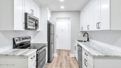 Welcome home to this fully renovated 2-bedroom, 1-bath condo on Pine Brook Golf Course in New Jersey - for sale on GolfHomes.com, golf home, golf lot