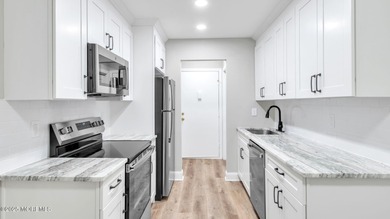 Welcome home to this fully renovated 2-bedroom, 1-bath condo on Pine Brook Golf Course in New Jersey - for sale on GolfHomes.com, golf home, golf lot