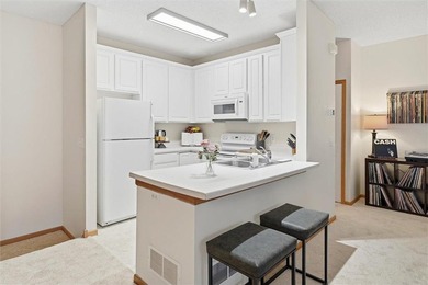 Move right in and enjoy easy Stillwater living with thoughtful on Loggers Trail Golf Club in Minnesota - for sale on GolfHomes.com, golf home, golf lot