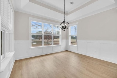 ALMOST NEW-- MOVE-IN READY! Loved as an infrequently used on The Patriot Golf Club At Grand Harbor in South Carolina - for sale on GolfHomes.com, golf home, golf lot