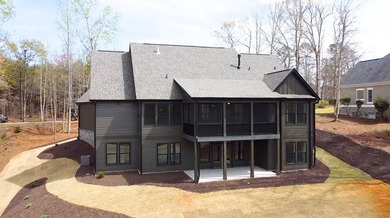 Live the lake life in this NEW Craftsman home in The Plantation on The Patriot Golf Club At Grand Harbor in South Carolina - for sale on GolfHomes.com, golf home, golf lot