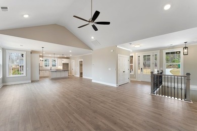 Live the lake life in this NEW Craftsman home in The Plantation on The Patriot Golf Club At Grand Harbor in South Carolina - for sale on GolfHomes.com, golf home, golf lot