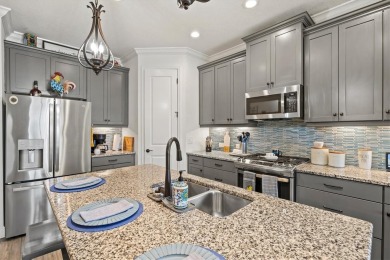Lakeside luxury on the largest lake in Canoe Creek defines this on Palmetto Pines Golf Course in Florida - for sale on GolfHomes.com, golf home, golf lot