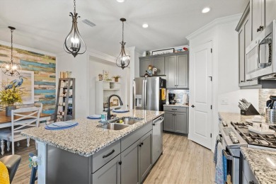 Lakeside luxury on the largest lake in Canoe Creek defines this on Palmetto Pines Golf Course in Florida - for sale on GolfHomes.com, golf home, golf lot