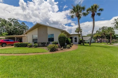 Discover the Florida lifestyle in this resort-style, corner lot on Highland Lakes Executive Golf Course in Florida - for sale on GolfHomes.com, golf home, golf lot