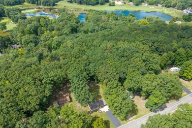 CUTE and COZY ranch home in the Heart of the Lakes. Immaculate on St. Ives Golf Club in Michigan - for sale on GolfHomes.com, golf home, golf lot